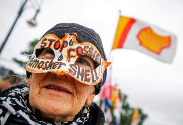 Activists outside an annual shareholder meeting of Royal Dutch Shell in Scheveningen, the Netherlands, in 2019.